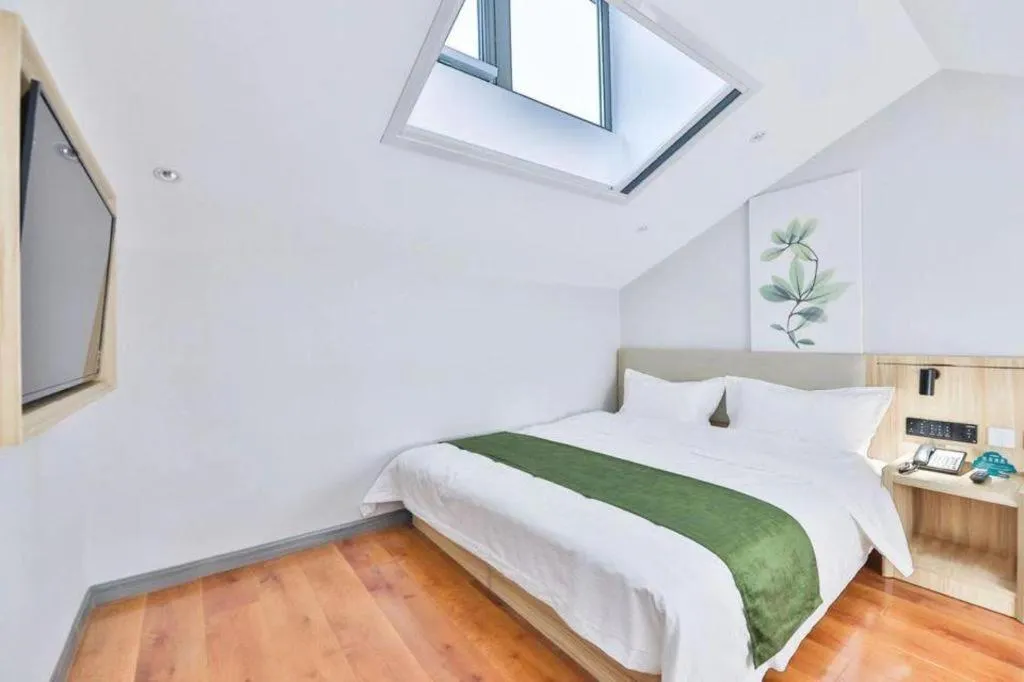 Bed in GreenTree Inn Express Beijing Dongcheng District Beixinqiao Metro Station Gui Street