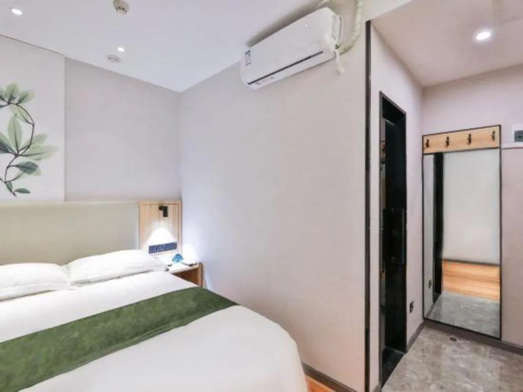 Bed in GreenTree Inn Express Beijing Dongcheng District Beixinqiao Metro Station Gui Street