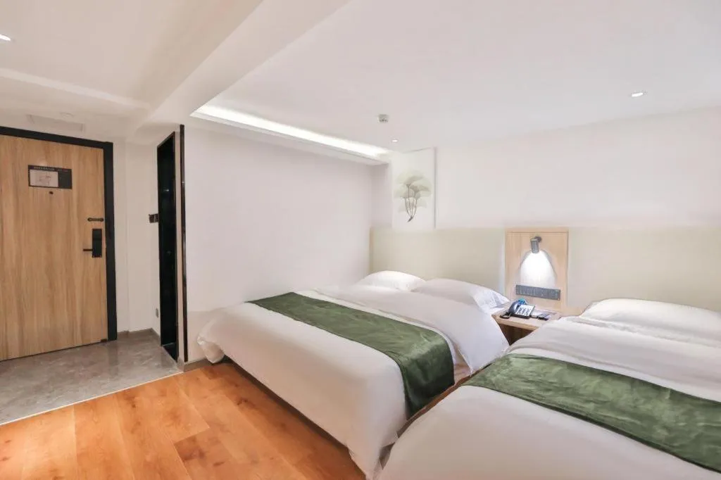 Bed in GreenTree Inn Express Beijing Dongcheng District Beixinqiao Metro Station Gui Street