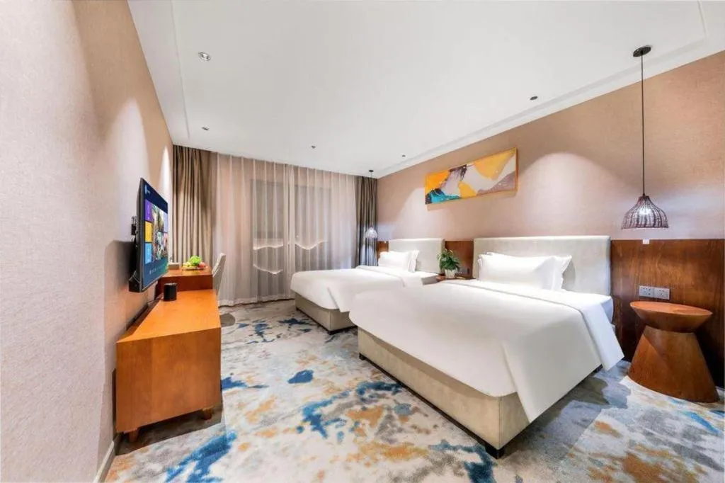 Bed in Xiangsu Boang Hotel