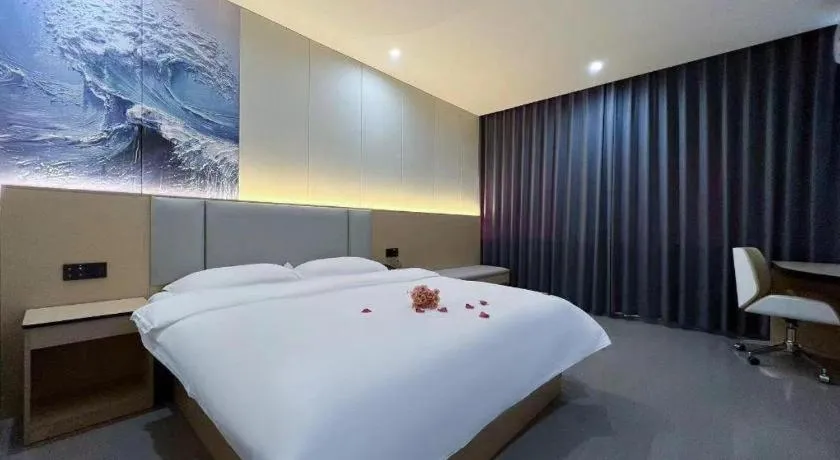 Bed in Super 8 Hotel Dingzhou Chongwen Street