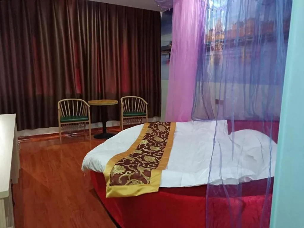 Bed in Super 8 Hotel Dingzhou Chongwen Street