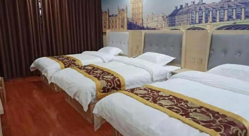 Bed in Super 8 Hotel Dingzhou Chongwen Street