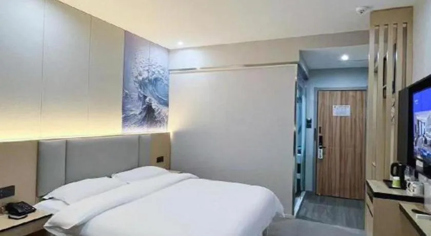 Bed in Super 8 Hotel Dingzhou Chongwen Street