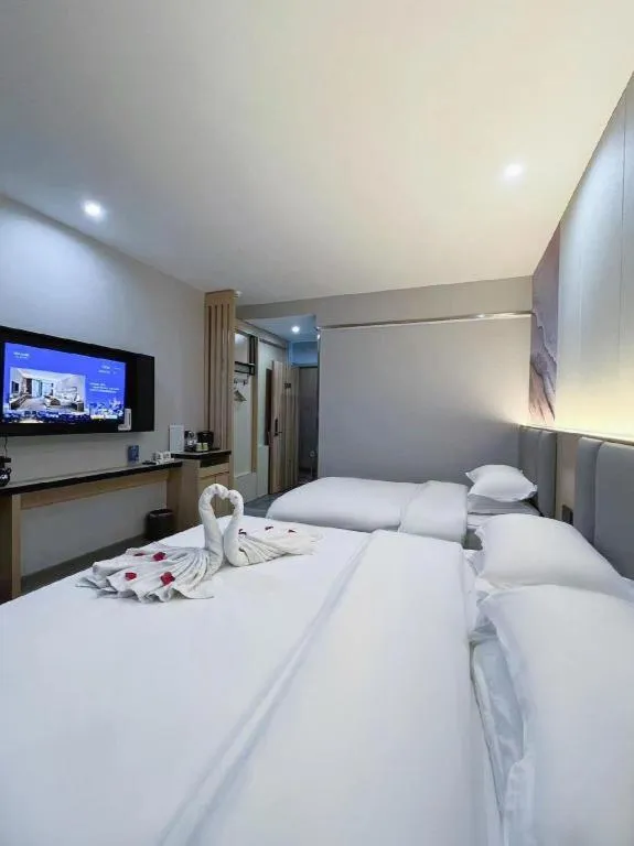 Bed in Super 8 Hotel Dingzhou Chongwen Street