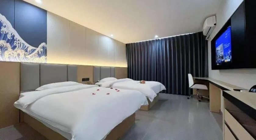 Bed in Super 8 Hotel Dingzhou Chongwen Street