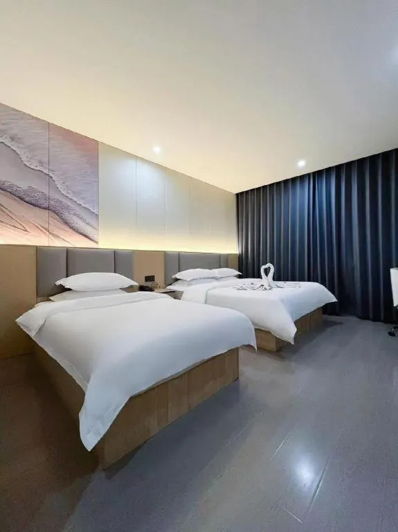 Bed in Super 8 Hotel Dingzhou Chongwen Street