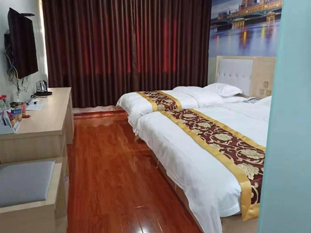 Bed in Super 8 Hotel Dingzhou Chongwen Street