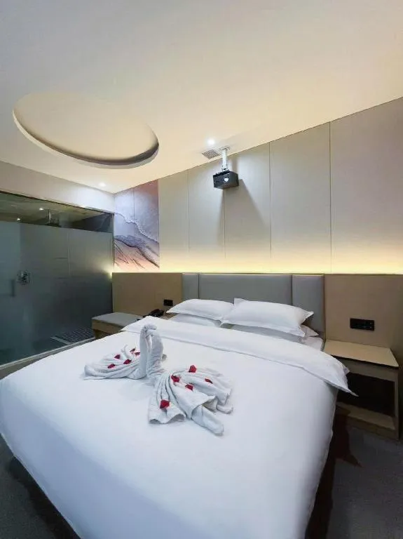 Bed in Super 8 Hotel Dingzhou Chongwen Street