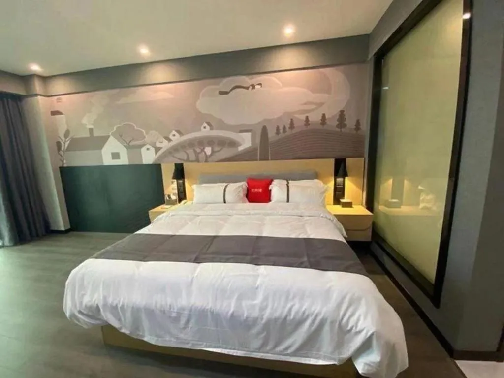 Bed in Thank Inn Jiangxi Nanchang Anyi County Fenghuangshan Industrial Park