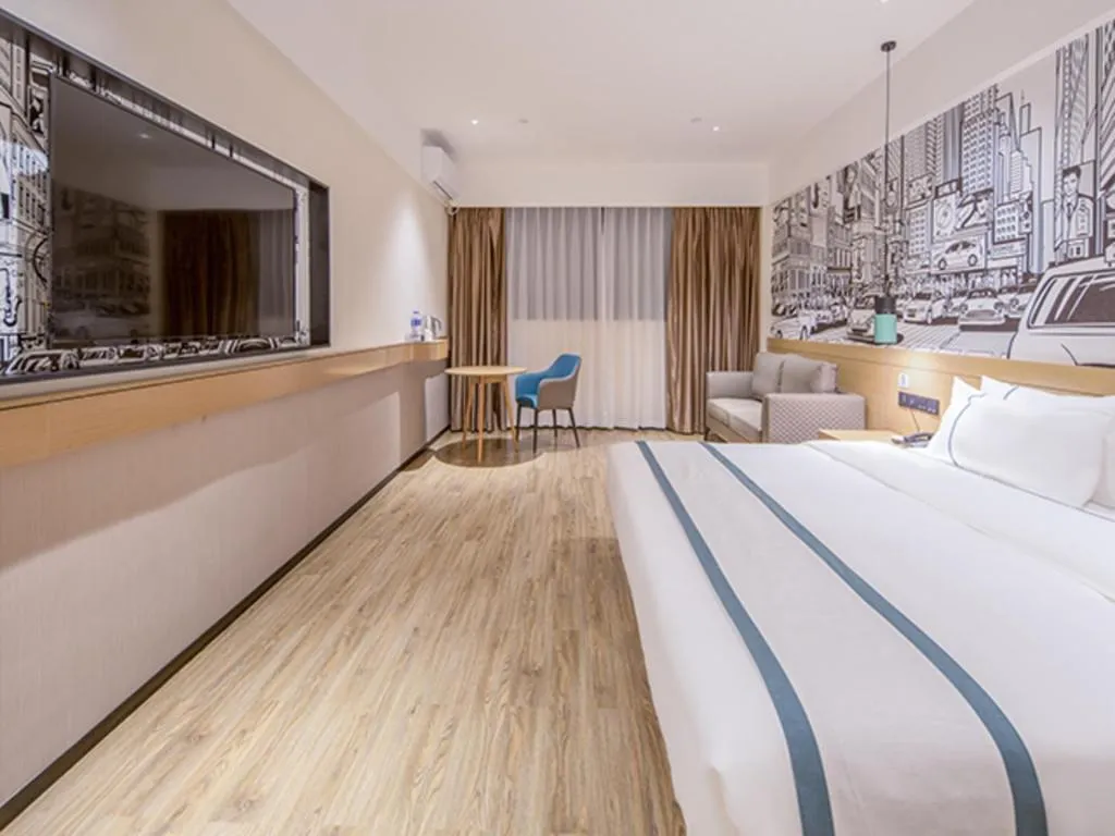 Bed in City Comfort Inn Wuzhou Xijiang Thrid Bridge