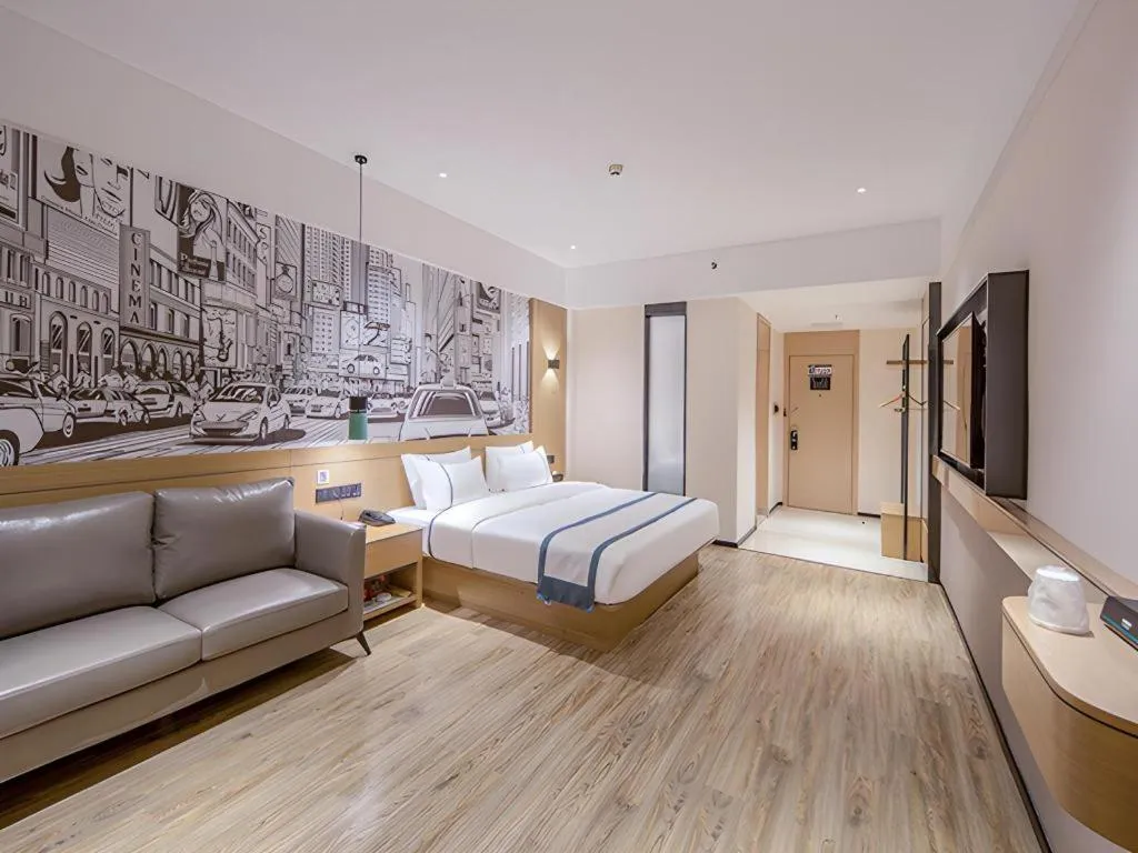 Bed in City Comfort Inn Wuzhou Xijiang Thrid Bridge