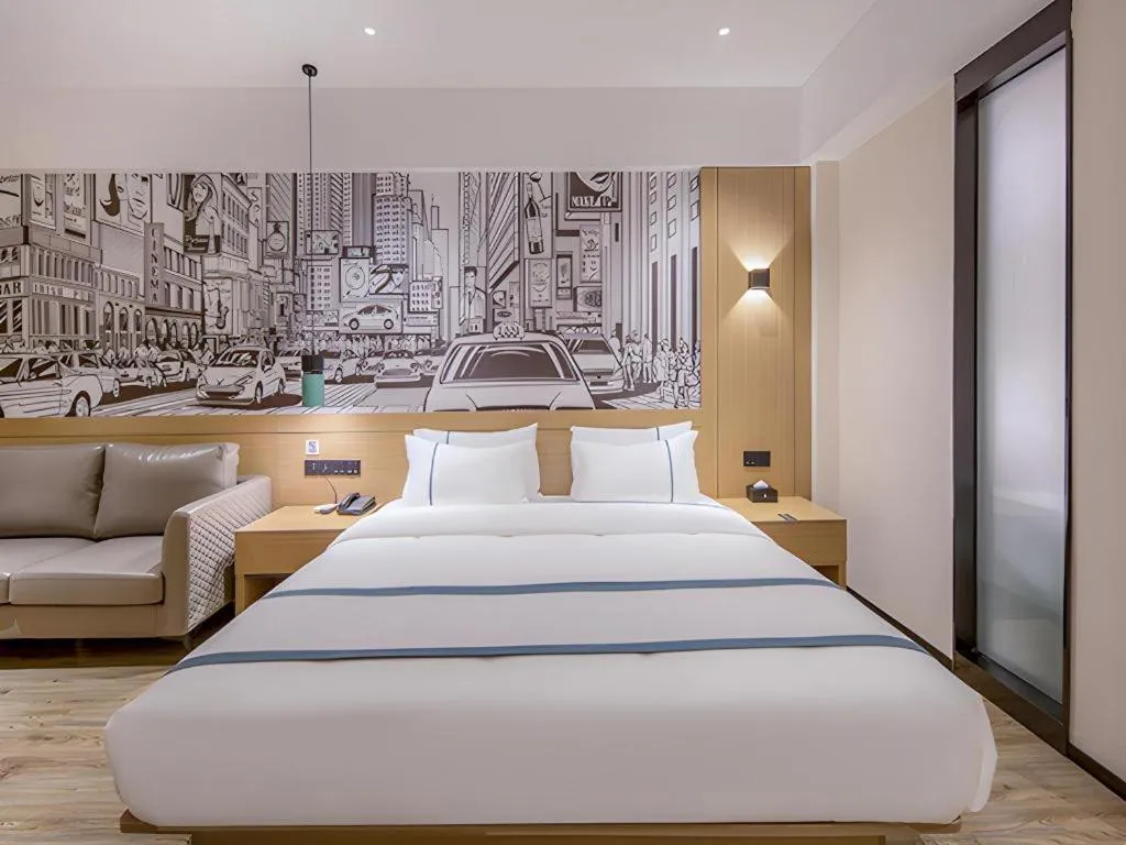 Bed in City Comfort Inn Wuzhou Xijiang Thrid Bridge