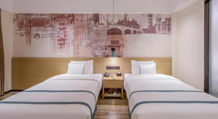 Bed in City Comfort Inn Wuzhou Xijiang Thrid Bridge