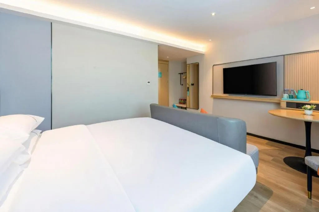 Bed in City Comfort Inn Yunfu Xinxing Juncheng Plaza