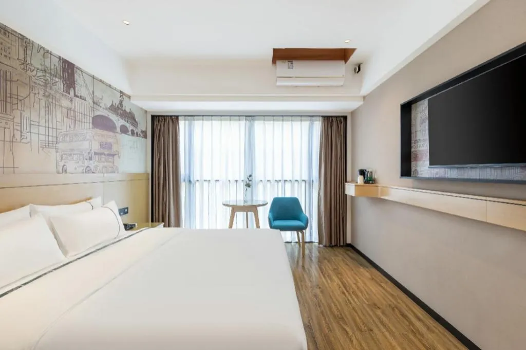 Bed in City Comfort Inn Yunfu Xinxing Juncheng Plaza