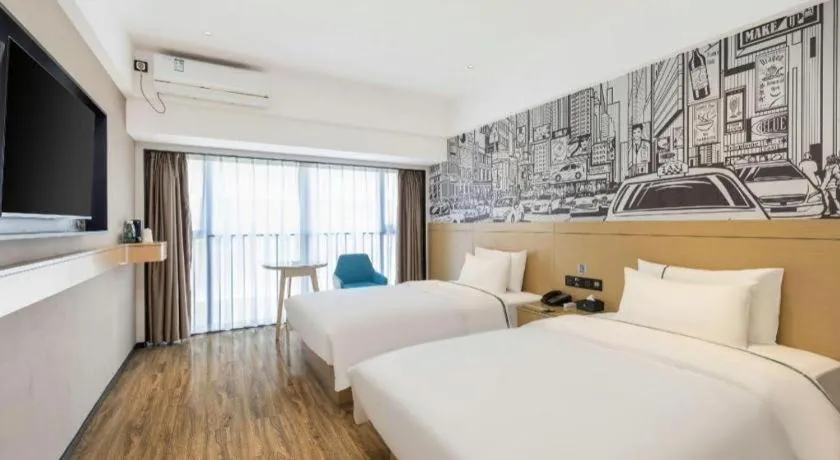 Bed in City Comfort Inn Yunfu Xinxing Juncheng Plaza