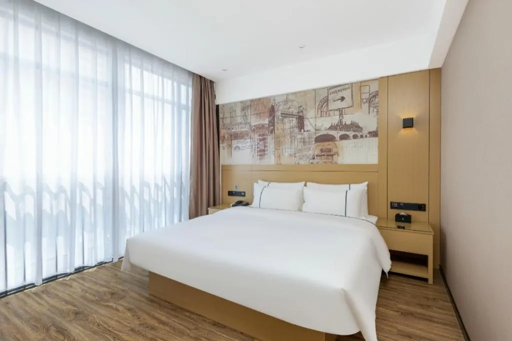 Bed in City Comfort Inn Yunfu Xinxing Juncheng Plaza