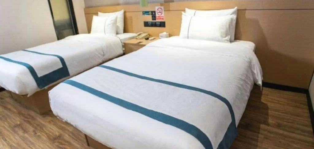 Bed in City Comfort Inn Yunfu Xinxing Juncheng Plaza