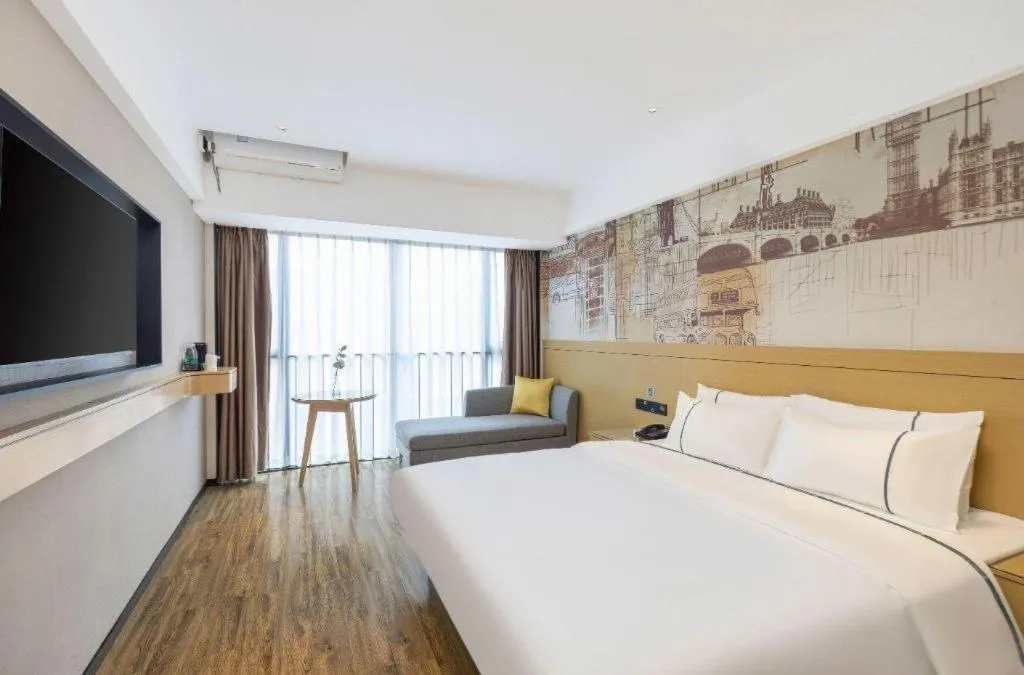 Bed in City Comfort Inn Yunfu Xinxing Juncheng Plaza