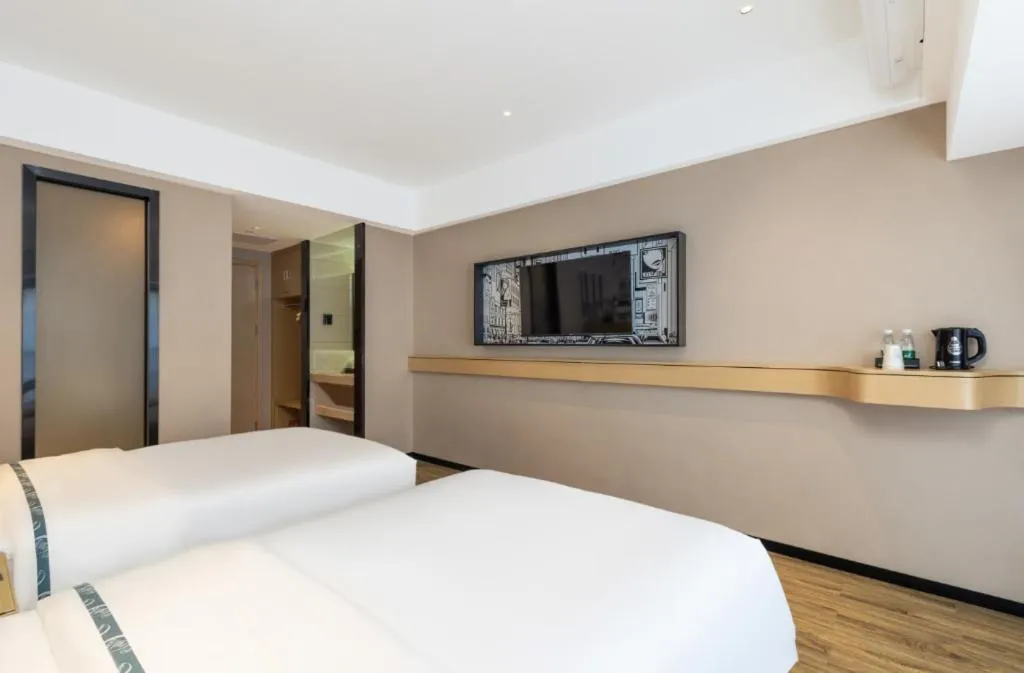 Bed in City Comfort Inn Yunfu Xinxing Juncheng Plaza