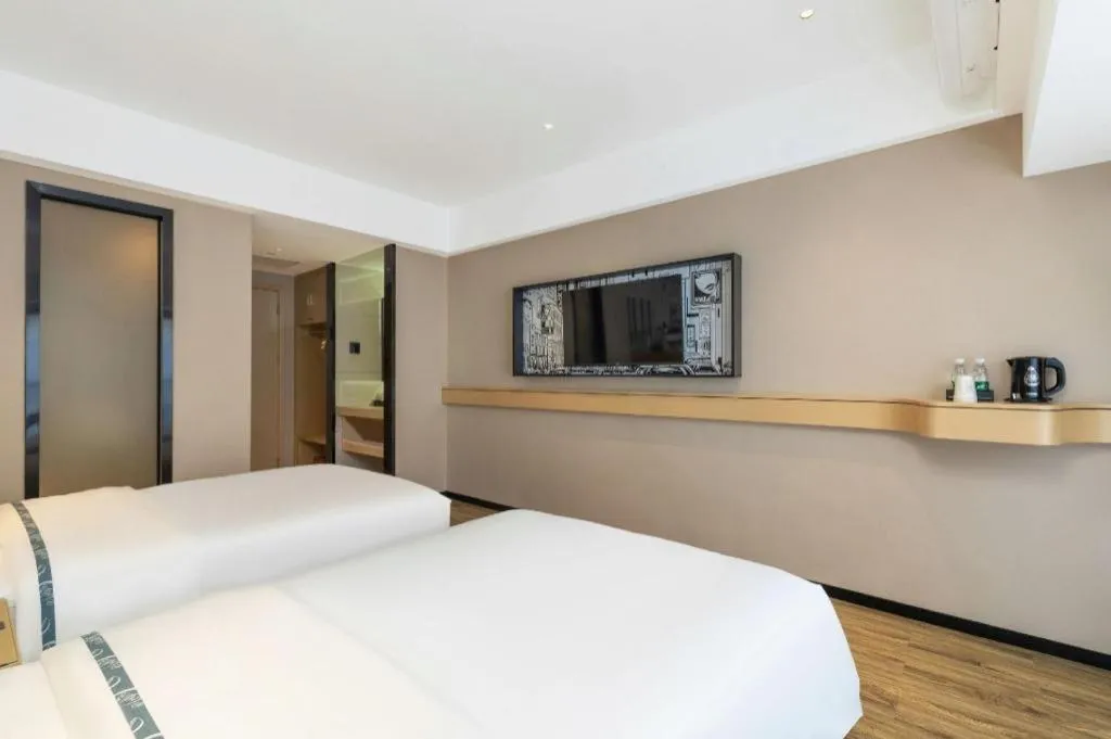 Bed in City Comfort Inn Yunfu Xinxing Juncheng Plaza