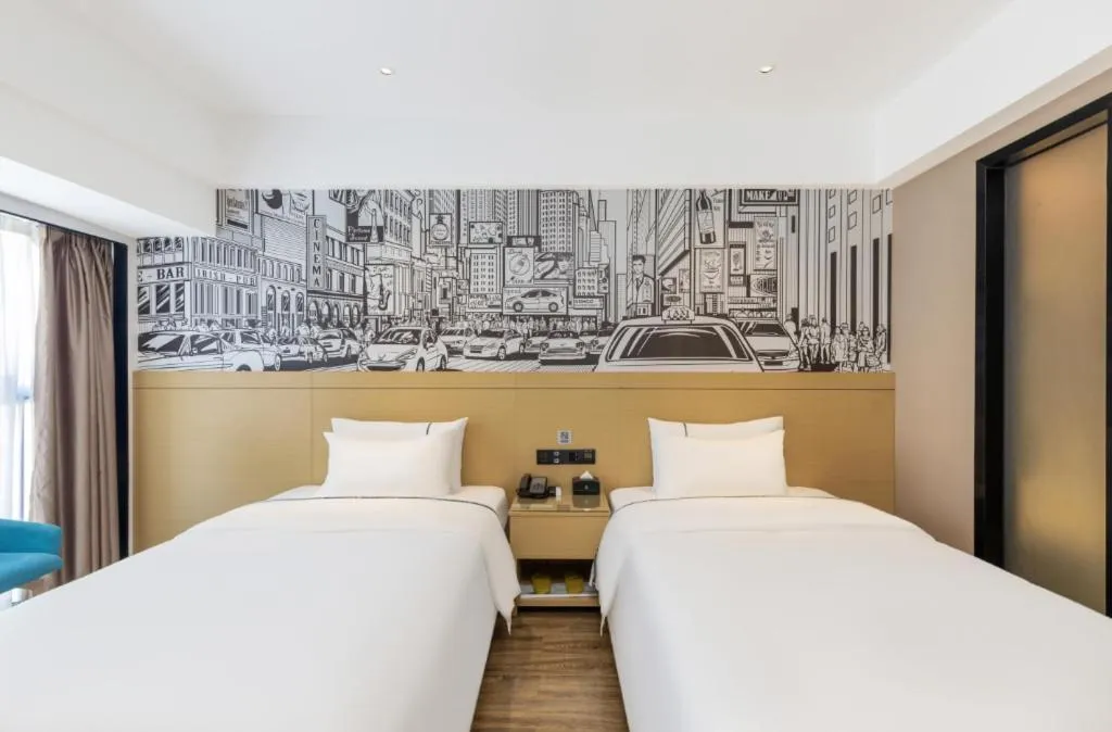 Bed in City Comfort Inn Yunfu Xinxing Juncheng Plaza