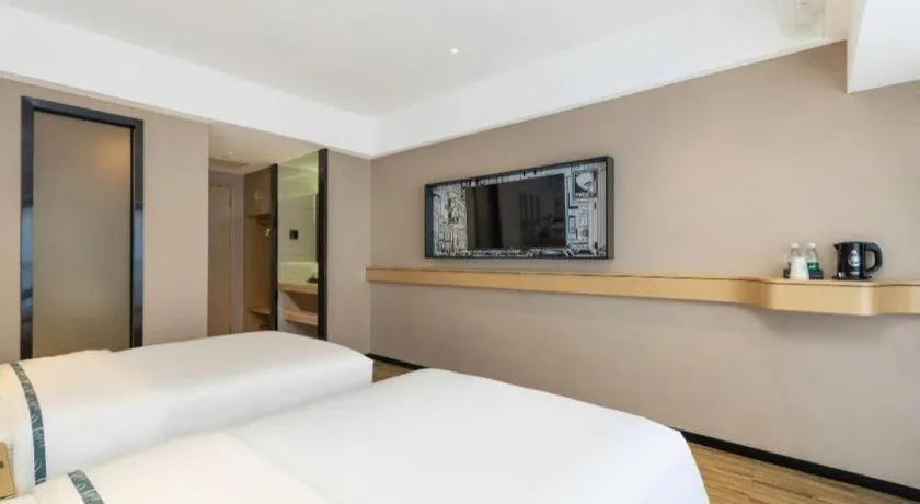 Bed in City Comfort Inn Yunfu Xinxing Juncheng Plaza