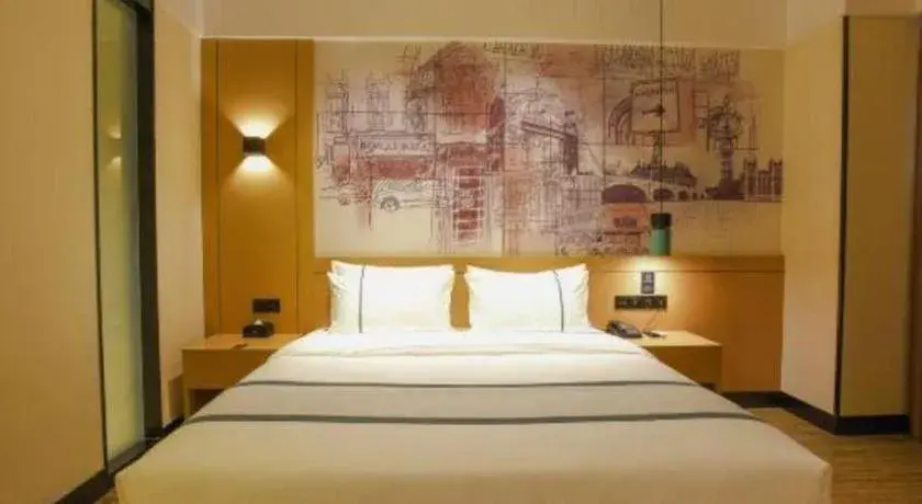 Bed in City Comfort Inn Luocheng Bus Terminal Bed in City Comfort Inn Luocheng Bus Terminal