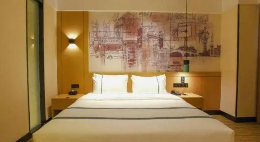 Bed in City Comfort Inn Luocheng Bus Terminal Bed in City Comfort Inn Luocheng Bus Terminal