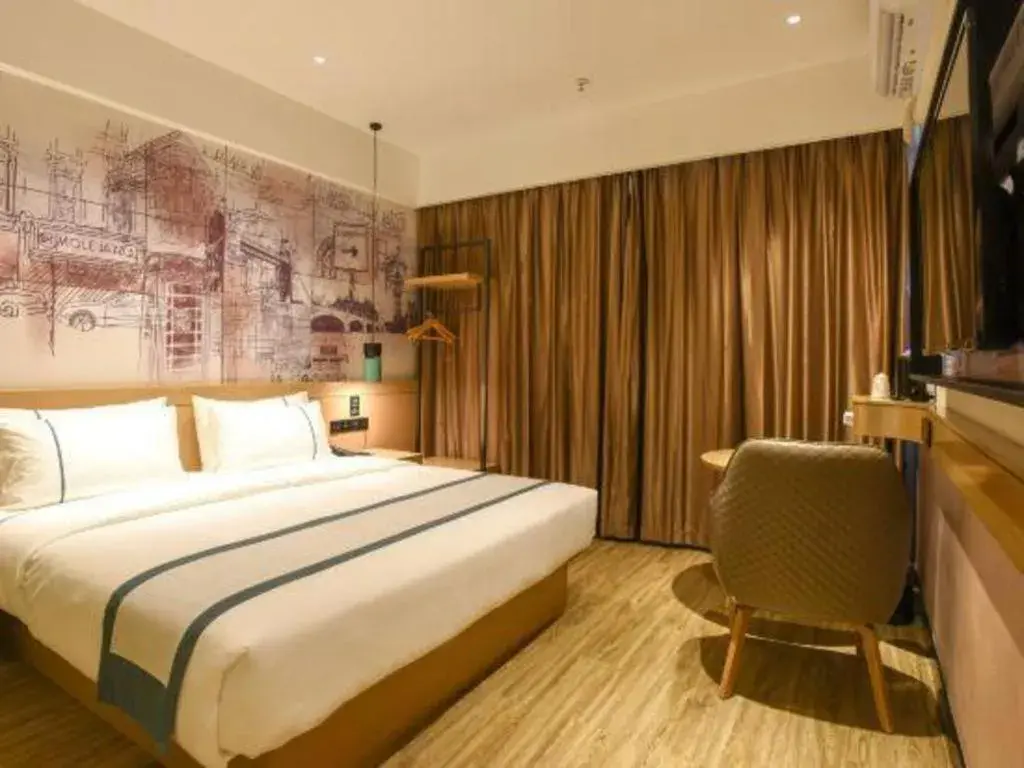 Bed in City Comfort Inn Luocheng Bus Terminal Bed in City Comfort Inn Luocheng Bus Terminal