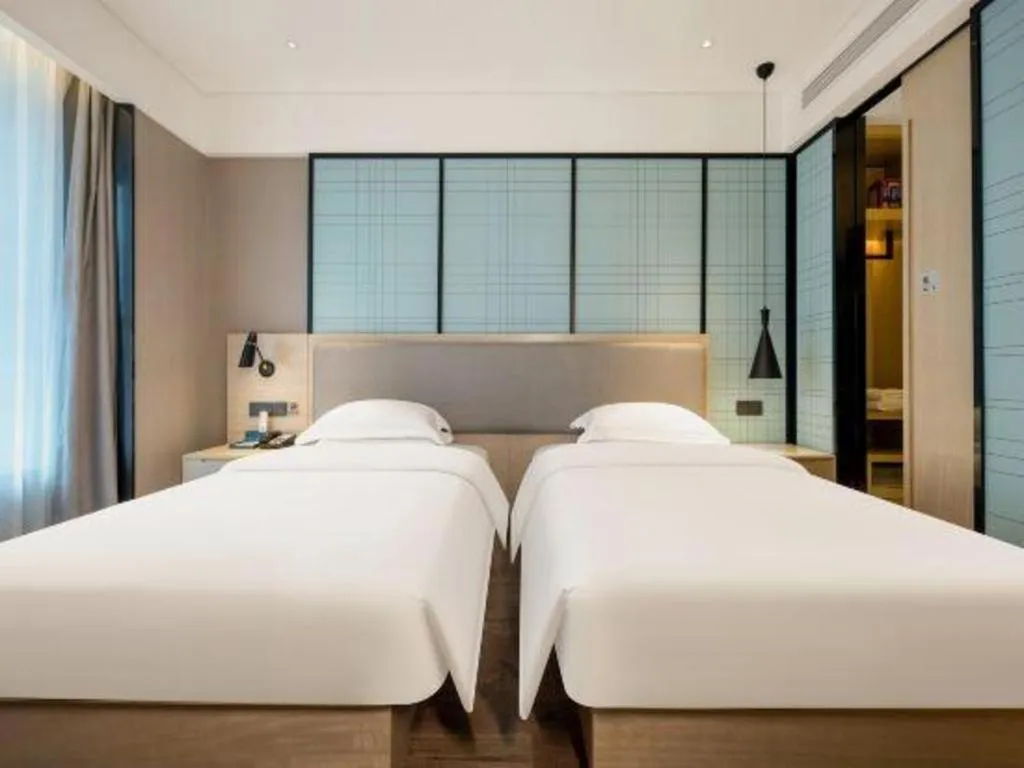 Bed in Echarm Hotel Nanning the MixC Dongmeng Business District