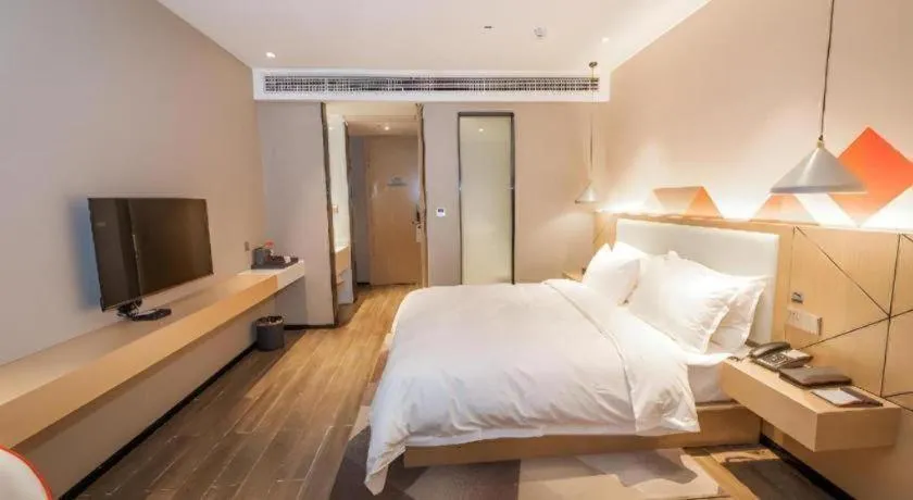 Bed in Borrman Hotel Yongzhou High Speed Railway Station