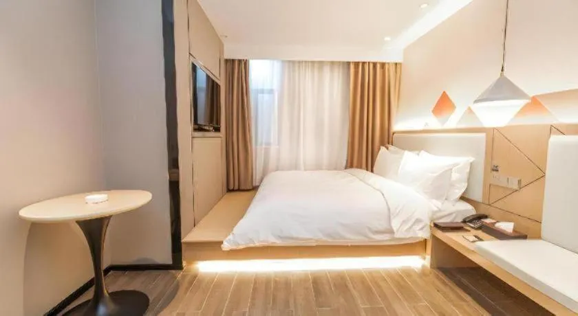 Bed in Borrman Hotel Yongzhou High Speed Railway Station