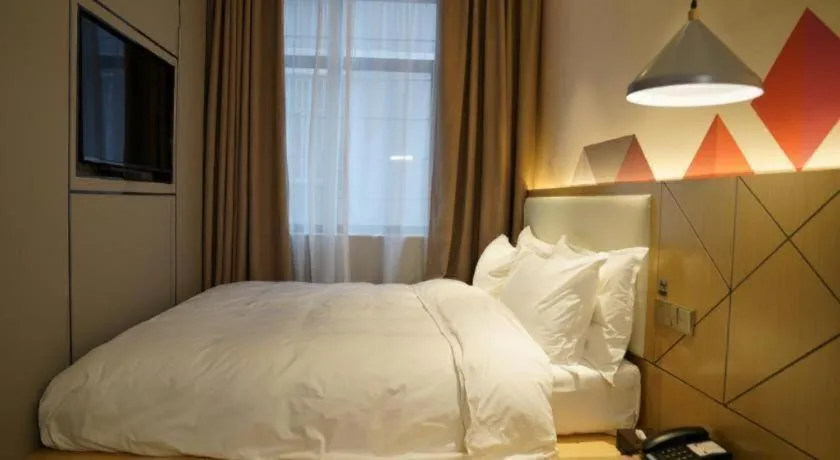 Bed in Borrman Hotel Yongzhou High Speed Railway Station