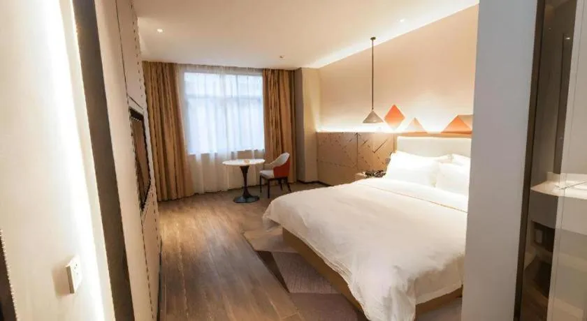 Bed in Borrman Hotel Yongzhou High Speed Railway Station