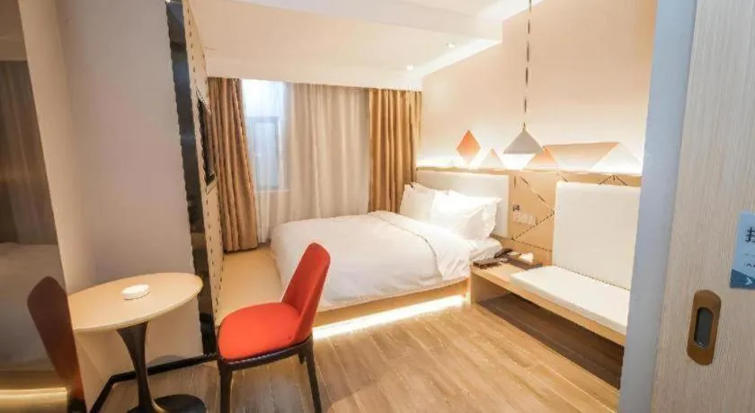 Bed in Borrman Hotel Yongzhou High Speed Railway Station