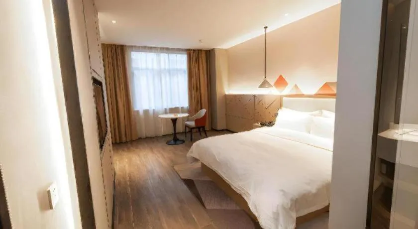 Bed in Borrman Hotel Yongzhou High Speed Railway Station