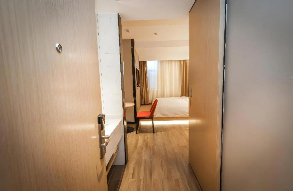 Bed in Borrman Hotel Yongzhou High Speed Railway Station