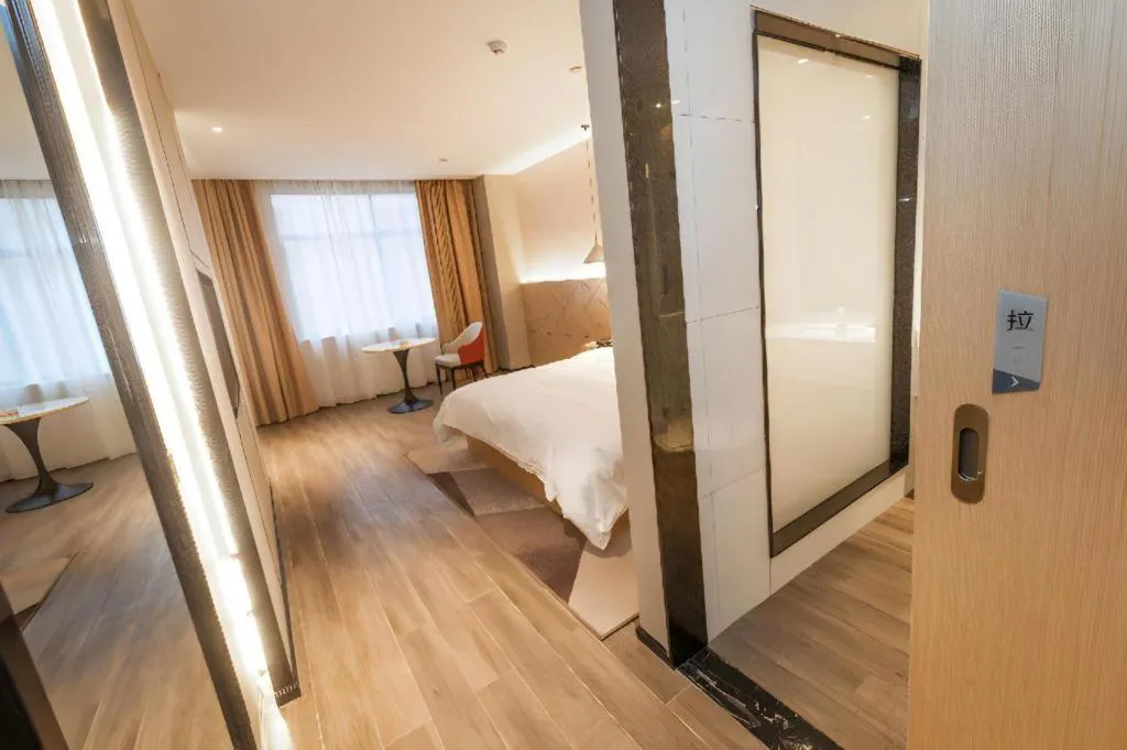 Bed in Borrman Hotel Yongzhou High Speed Railway Station