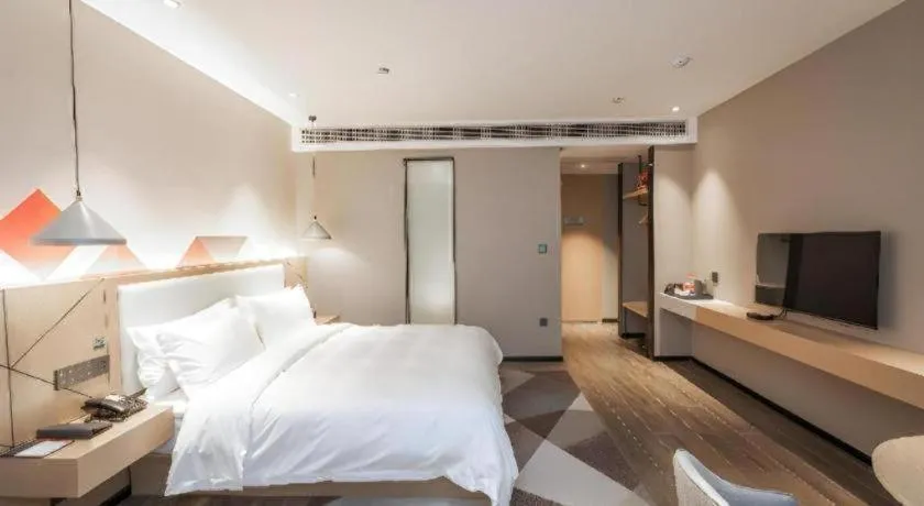 Bed in Borrman Hotel Yongzhou High Speed Railway Station