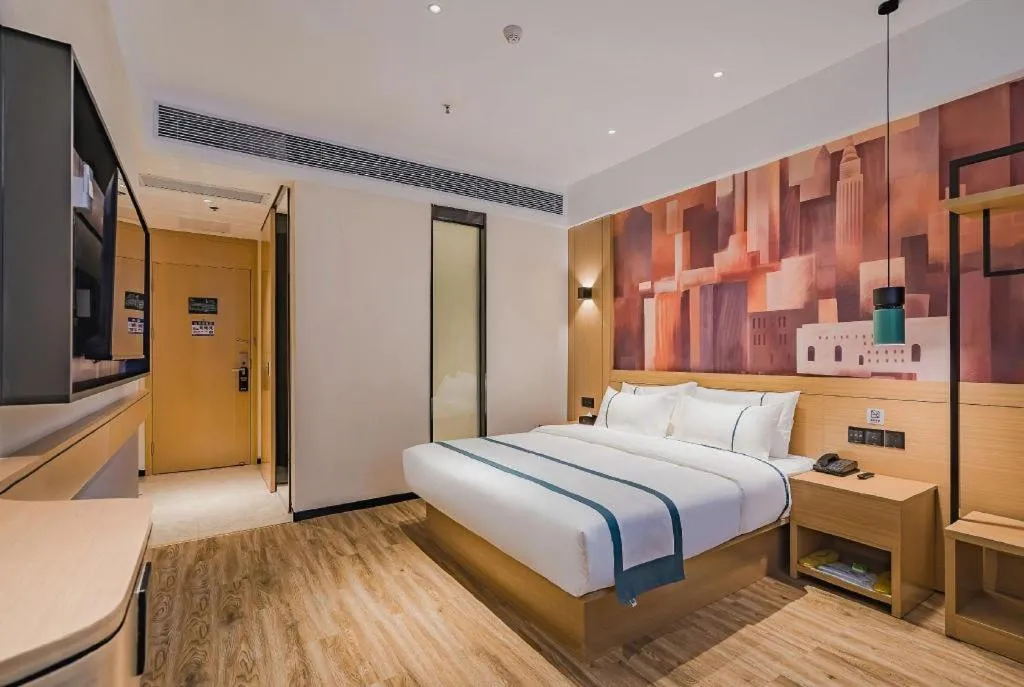 Bed in City Comfort Inn Hotel Dongguan Humen Pedestrian Street