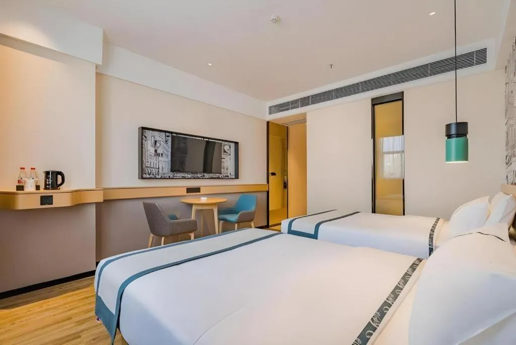 Bed in City Comfort Inn Hotel Dongguan Humen Pedestrian Street