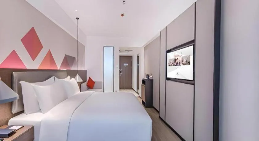 Bed in Borrman Hotel Hezhou High Speed Railway Station Guangming Avenue