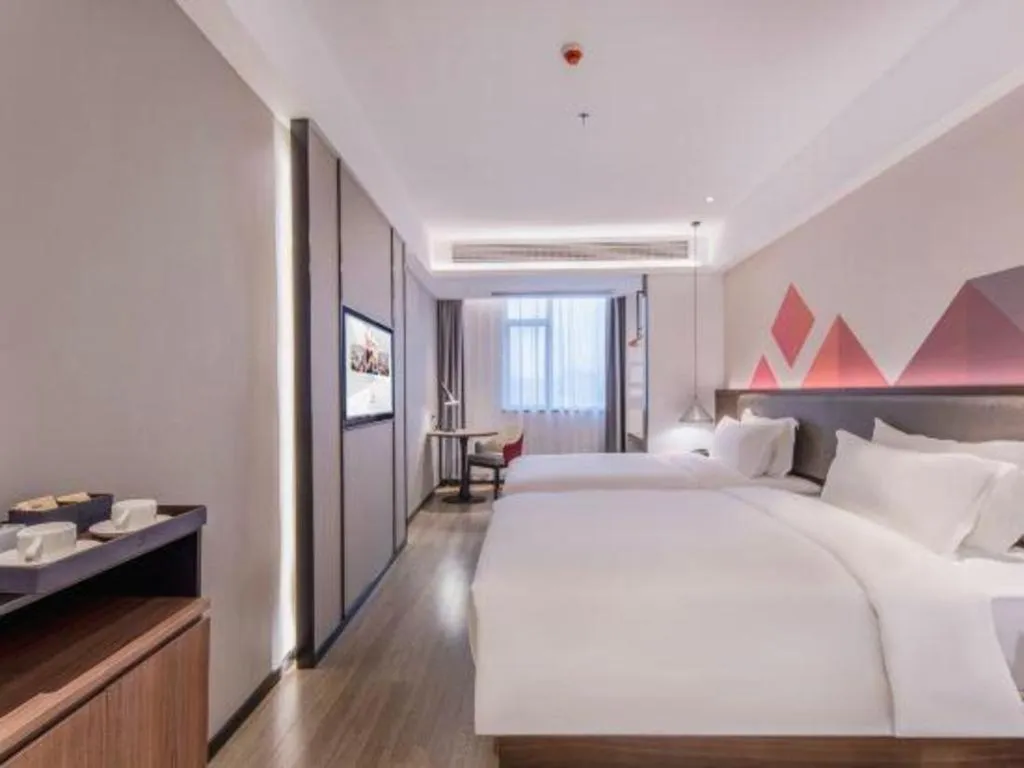 Bed in Borrman Hotel Hezhou High Speed Railway Station Guangming Avenue