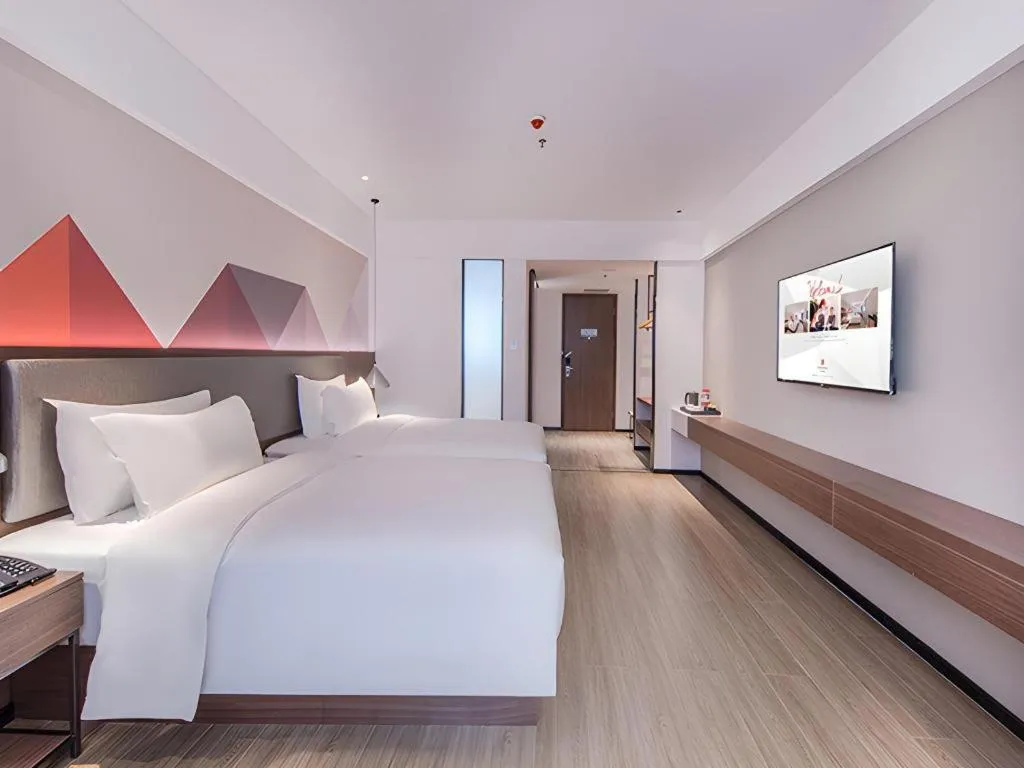 Bed in Borrman Hotel Hezhou High Speed Railway Station Guangming Avenue