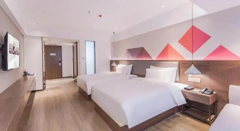 Bed in Borrman Hotel Hezhou High Speed Railway Station Guangming Avenue Bed in Borrman Hotel Hezhou High Speed Railway Station Guangming Avenue