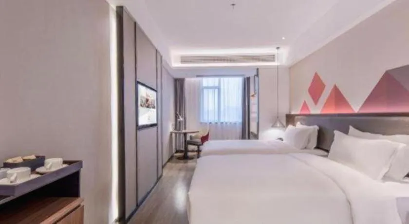 Bed in Borrman Hotel Hezhou High Speed Railway Station Guangming Avenue