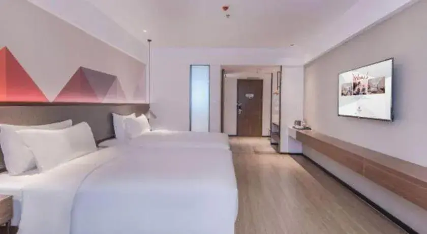 Bed in Borrman Hotel Hezhou High Speed Railway Station Guangming Avenue Bed in Borrman Hotel Hezhou High Speed Railway Station Guangming Avenue