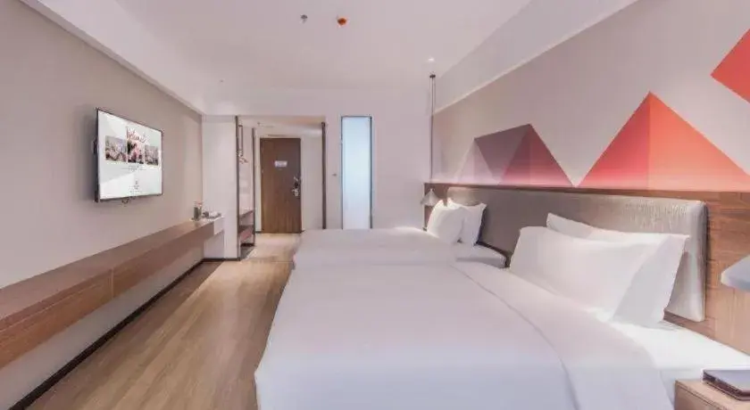 Bed in Borrman Hotel Hezhou High Speed Railway Station Guangming Avenue Bed in Borrman Hotel Hezhou High Speed Railway Station Guangming Avenue